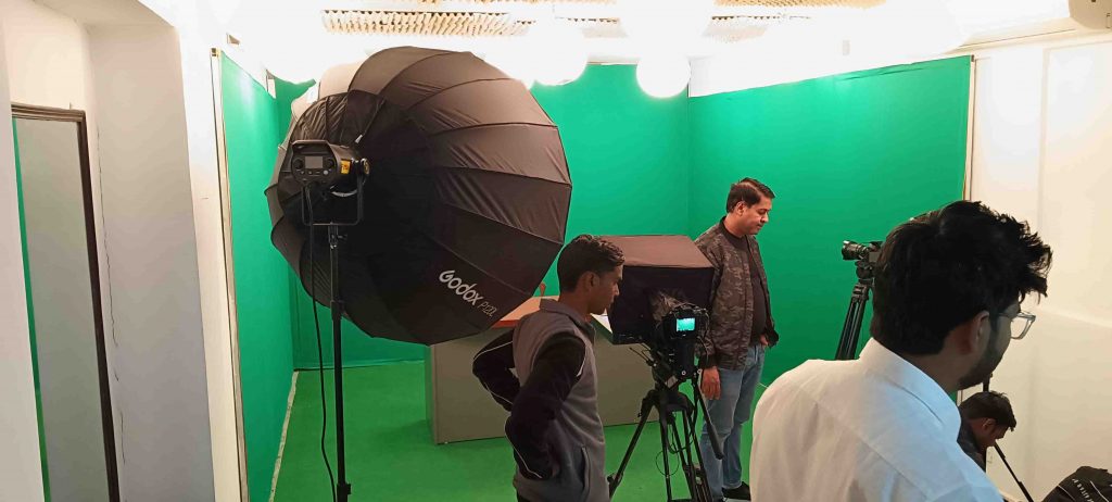green screen chroma studio with furniture & lights & teleprompter
